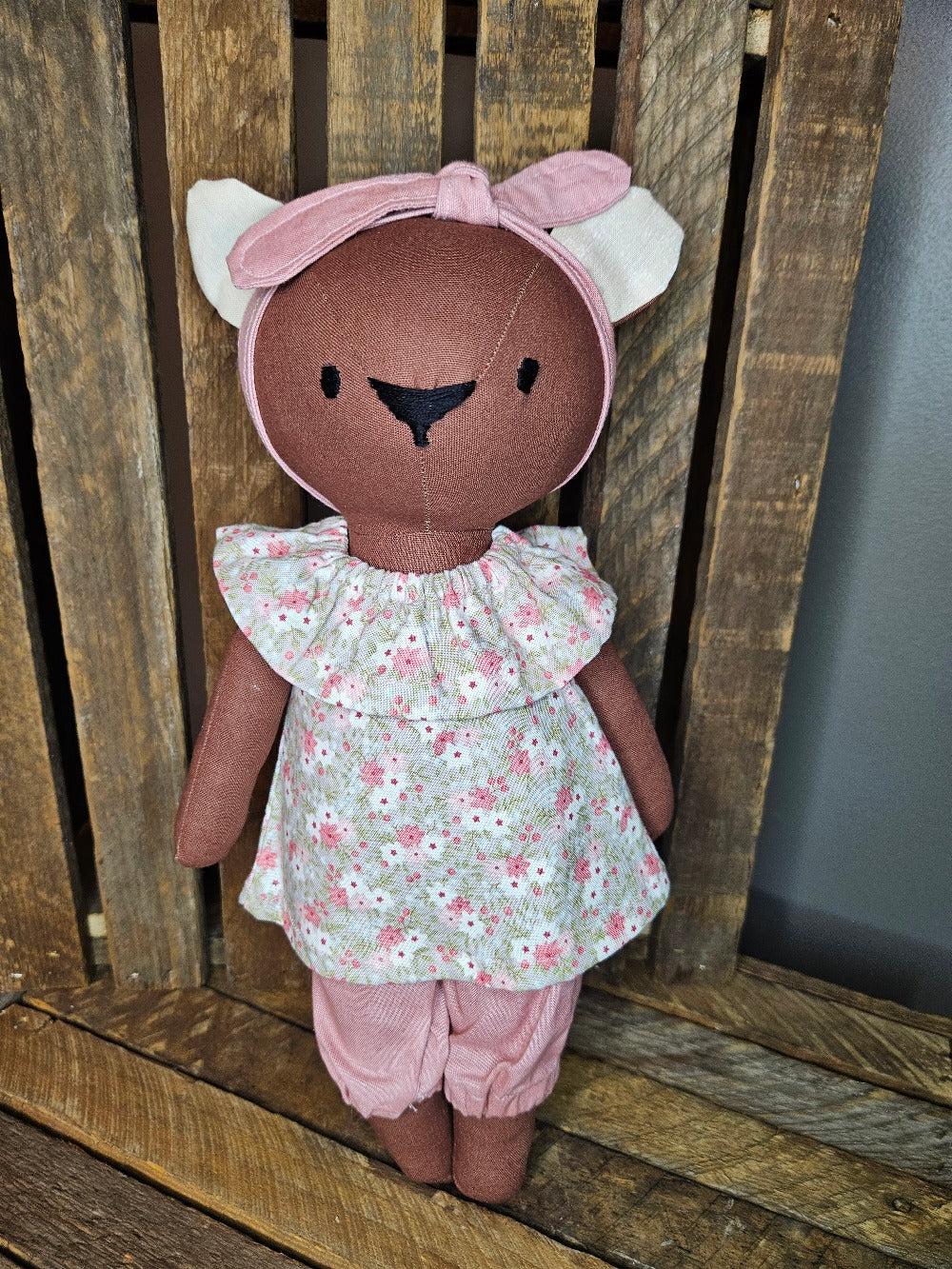 Brown bear with pink floral top and pink pants