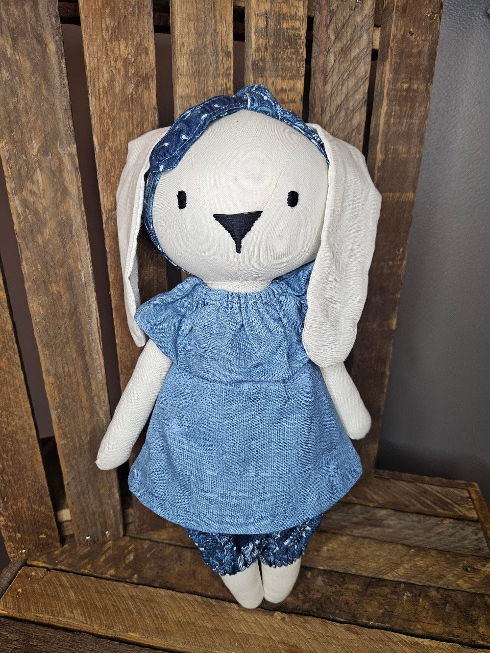 Cream bunny with denim blue top and dark denim print pants
