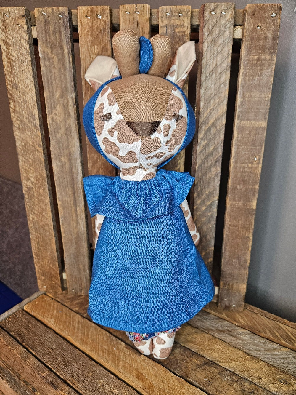 Giraffe in denim blue dress