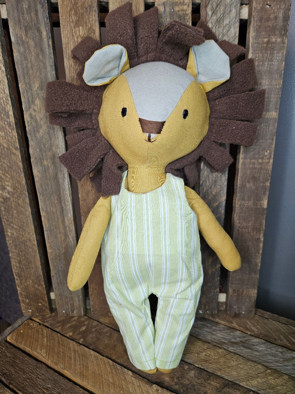 Lion with light green stripe overalls