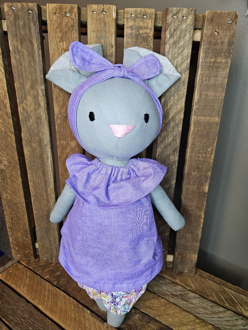 Gray mouse with lavender purple top and floral print pants