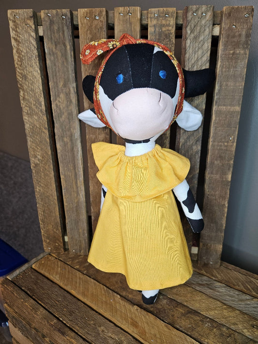 Black & White Cow in yellow dress with daisy headband