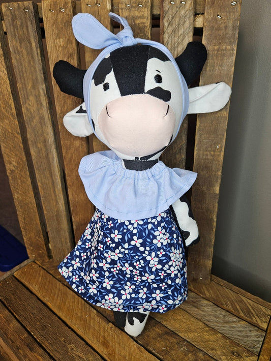 Black & White Cow with blue floral dress