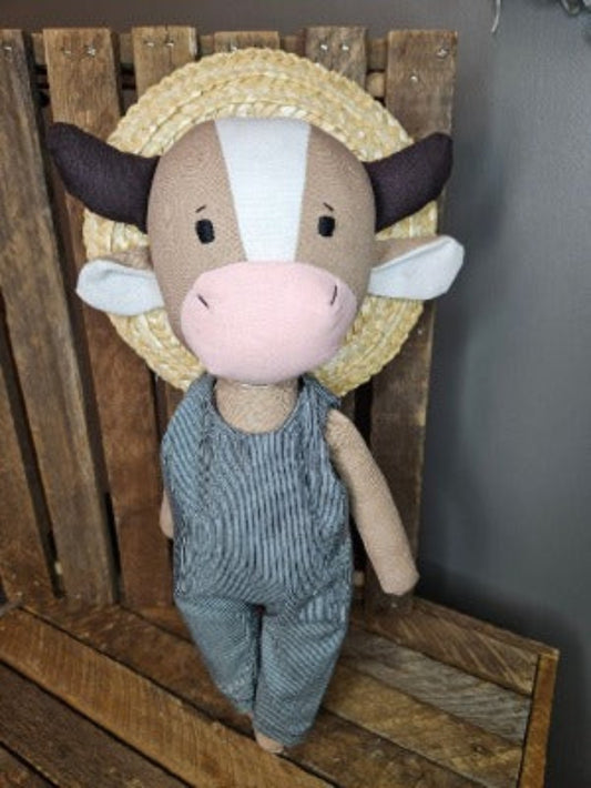 Brown Cow with Blue Pinstripe Overalls and Straw Hat