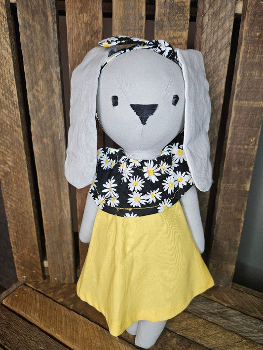 Tan bunny with yellow and black daisy dress
