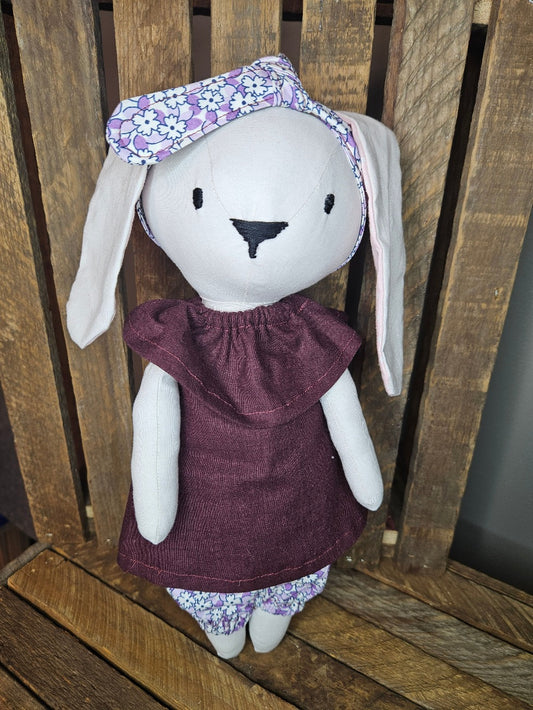 Cream bunny with eggplant purple top and purple print pants