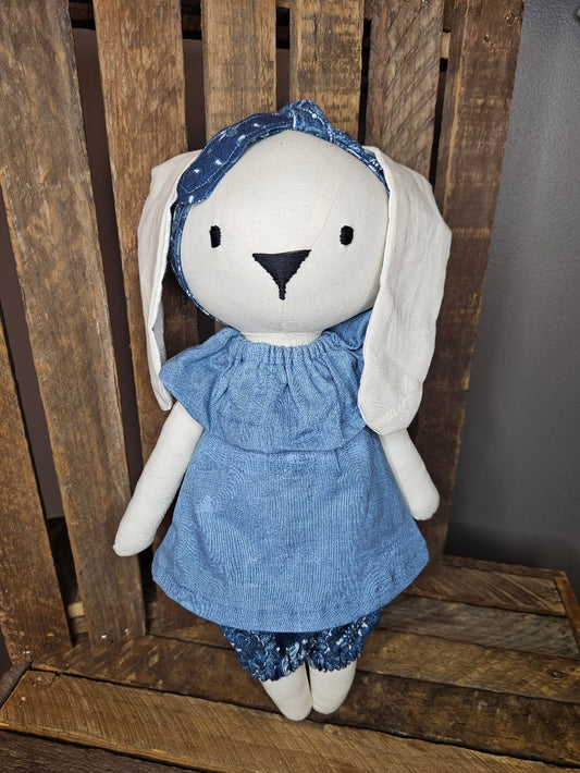 Cream bunny with denim blue top and dark denim print pants