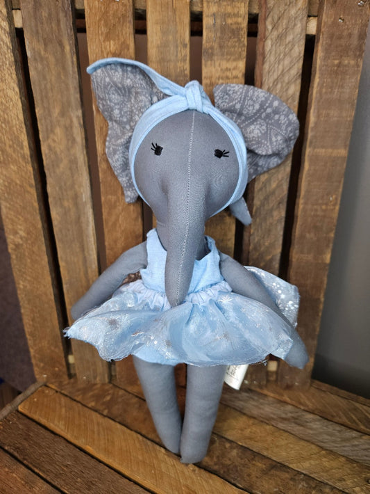 Dark gray elephant with an ice blue tutu