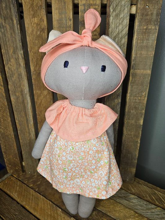 Light Brown Kitten with peach floral dress
