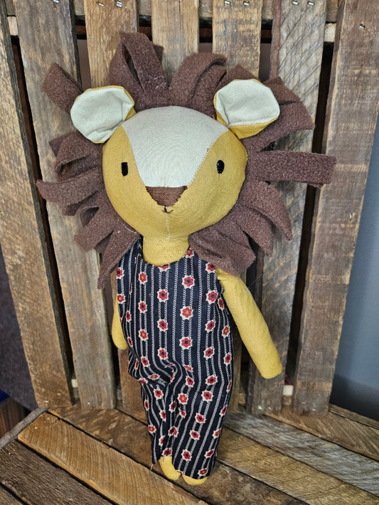 Lion with black stripe overalls and yellow/red sunflowers