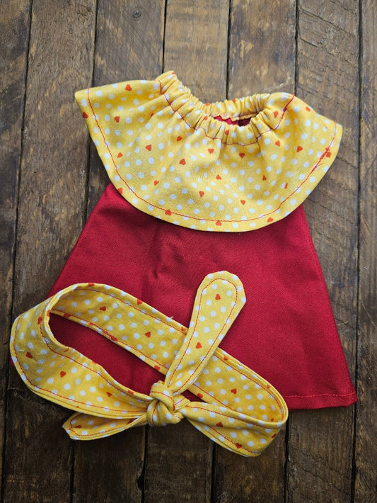 Red dress with yellow print collar and headband